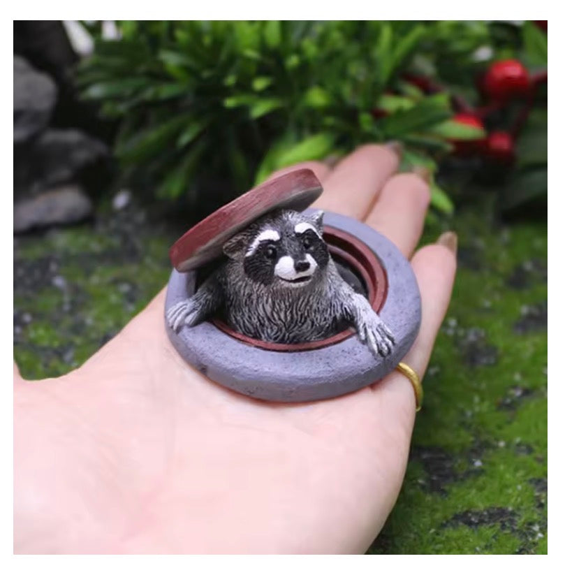 Peekaboo Raccoon Garden Ornament